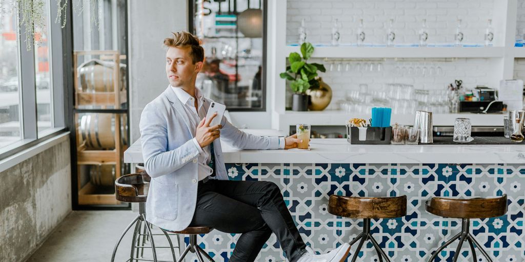 man sitting on stool